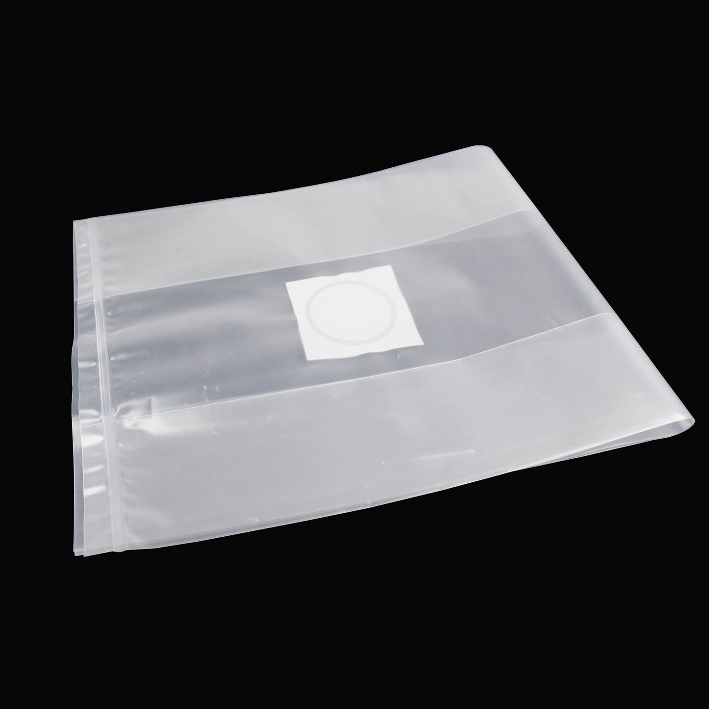 Clear plastic bag with a label on a black background