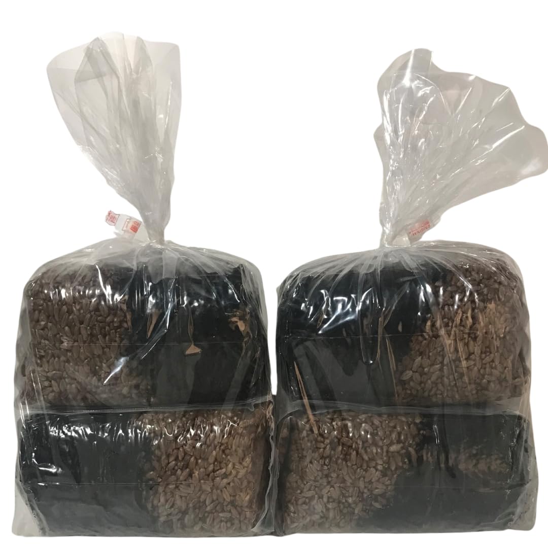 Two bags of soil or compost with clear plastic wrap on a white background